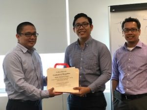 Charles Ventura receives a certificate of appreciation from Joli Patino and Bobby Espiritu